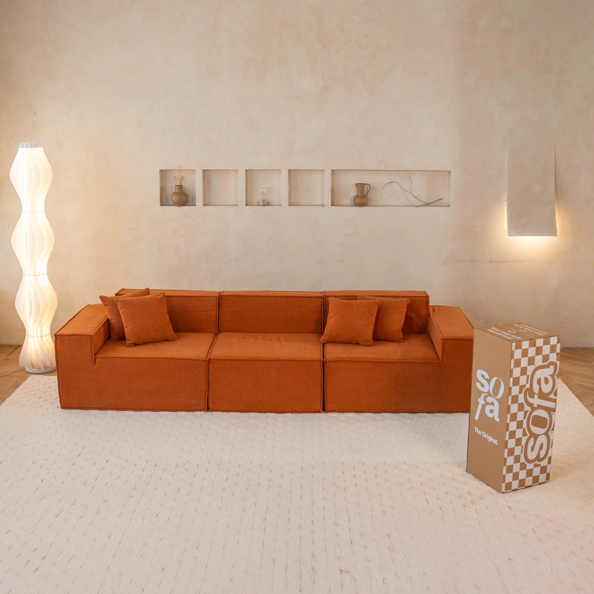 <tc>Sofa na Caixa</tc>  <tc>Pelion</tc> 3 lugares em Boucle - Orange